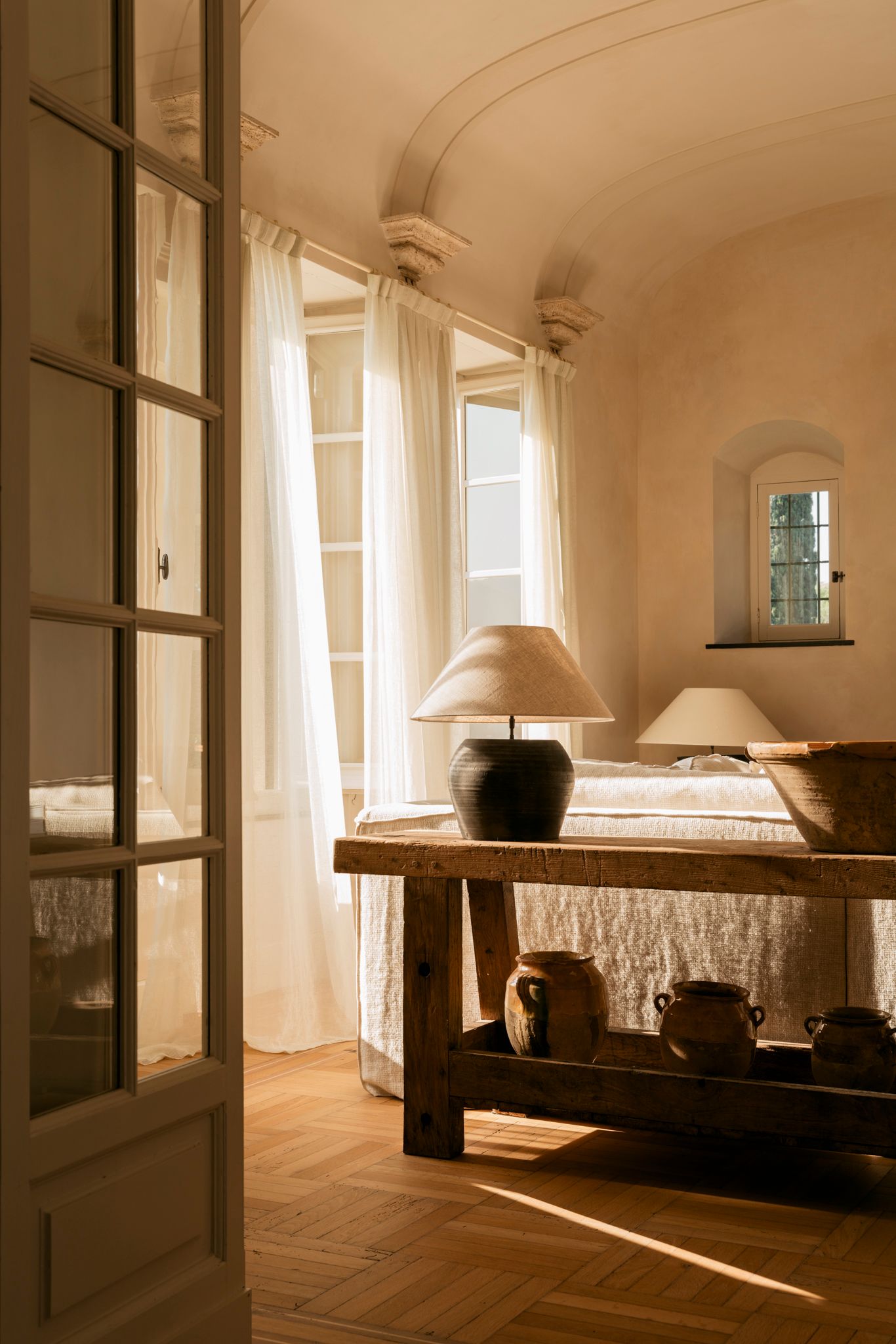 Table lamp curtains sofa