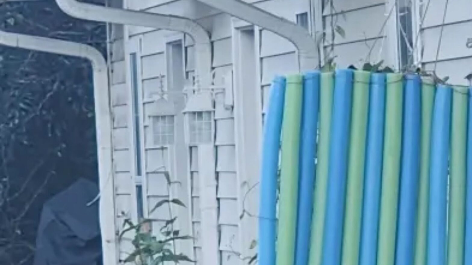 My neighbors have put up the worst privacy of all time, they are so bad people that a curtain would have been better