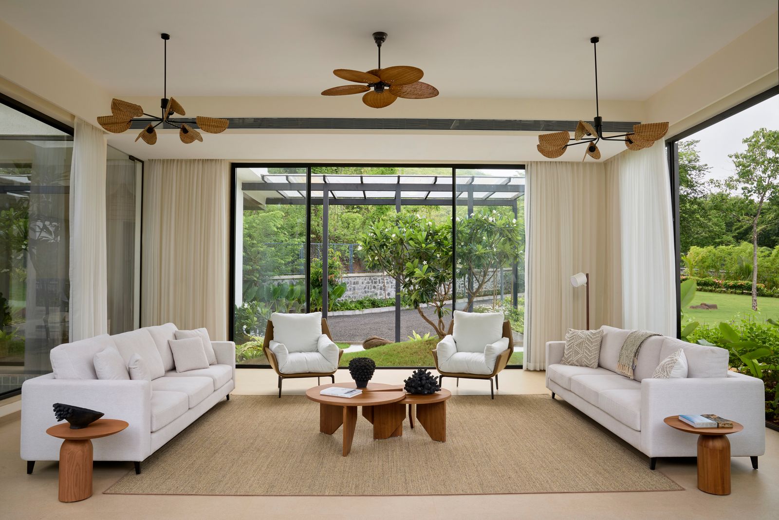 The palette of the house follows a subdued interaction of beige and white with rustic accents in the form of Wood Wicker and ...