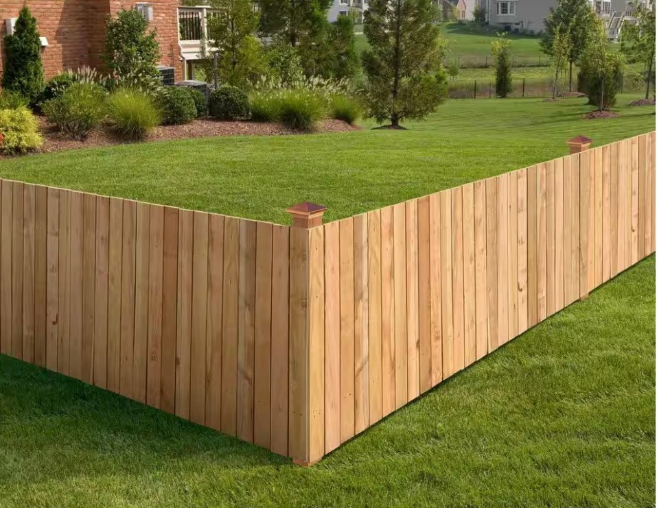 Wood privacy fence in the back yard.