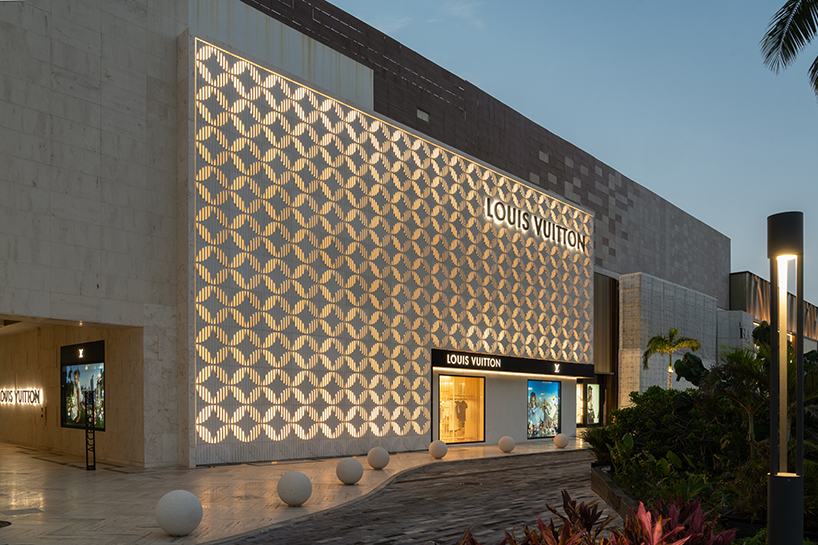 Louis Vuittons Cancun Boutique reveals concrete facade with shaped flower motif