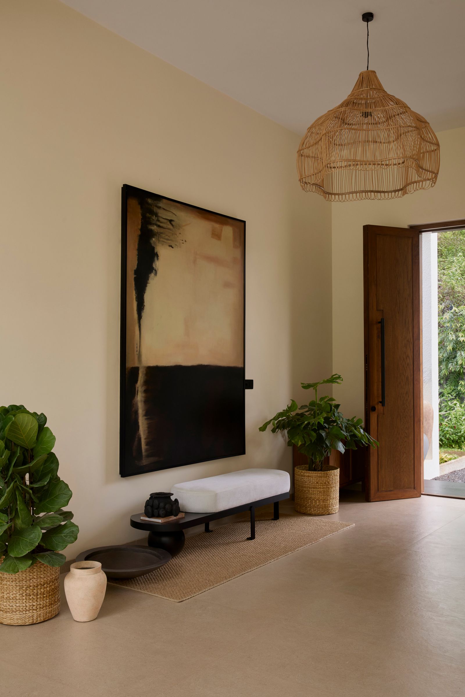This holiday home in Alibag offers an inner courtyard with a Lily pond and a pickle balls