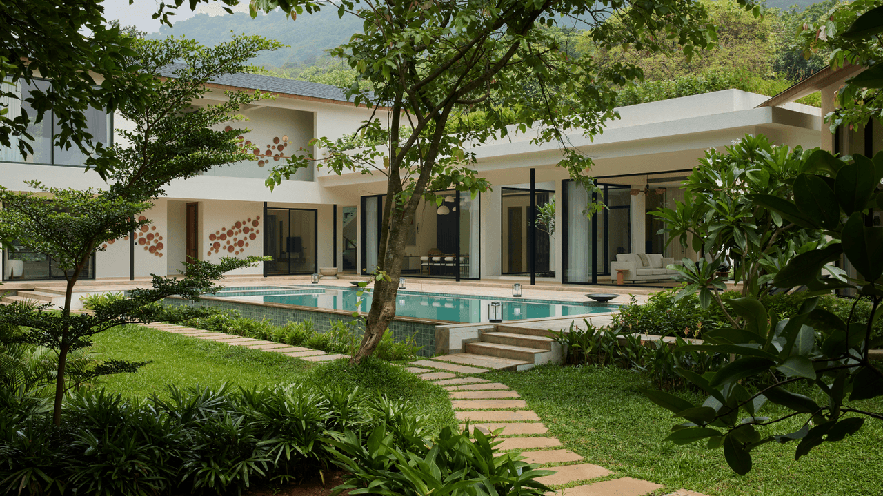 This holiday home in Alibag offers an inner courtyard with a Lily pond and a pickle balls