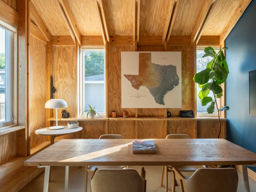 Meeting room with wooden walls and wooden furniture