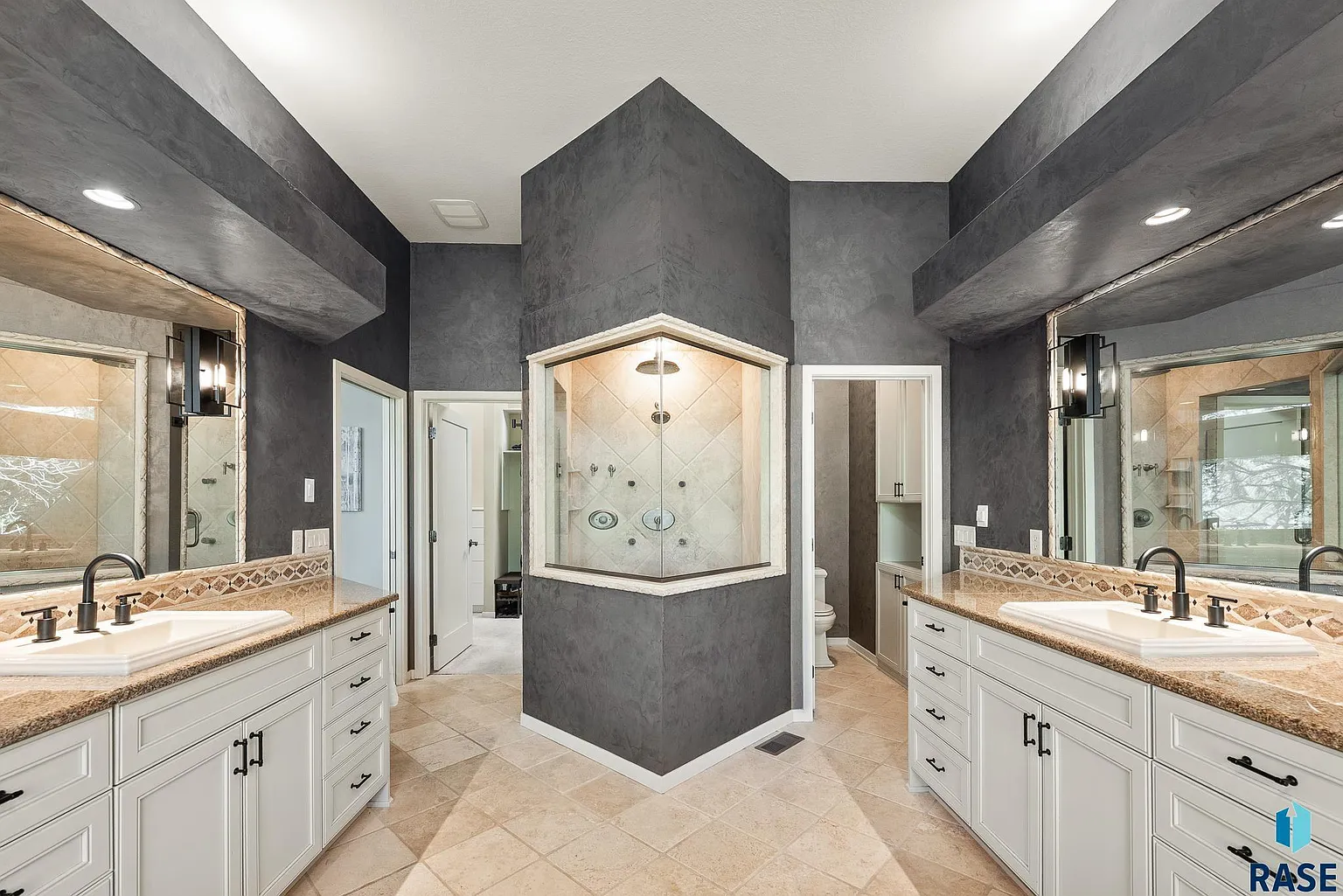 Embrace the spirit of Frank Lloyd Wright in this stunning custom home
