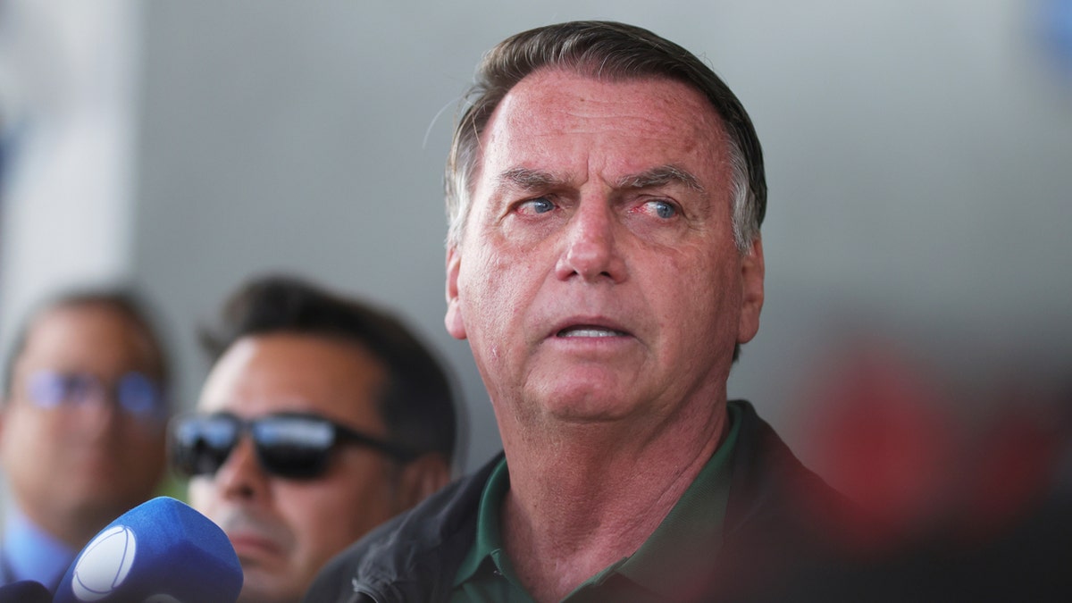 Former President of Brazil Jair Bolsonaro speaks to the press
