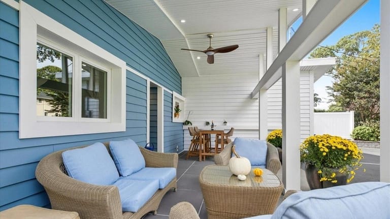 The current owners use the covered terrace as living space.