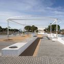 Over the fences – Clara Campoamor Square in San Silvestre de Guzmán / studio twentytwo – Image 3 of 24
