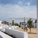 Over the fences – Clara Campoamor Square in San Silvestre de Guzmán / studio twentytwo – outdoor photography, concrete
