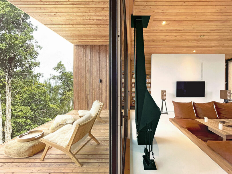 A modern house with a wooden deck and lounge chairs overlooking the trees on the left and a minimalist living room with a fireplace and brown seating on the right.