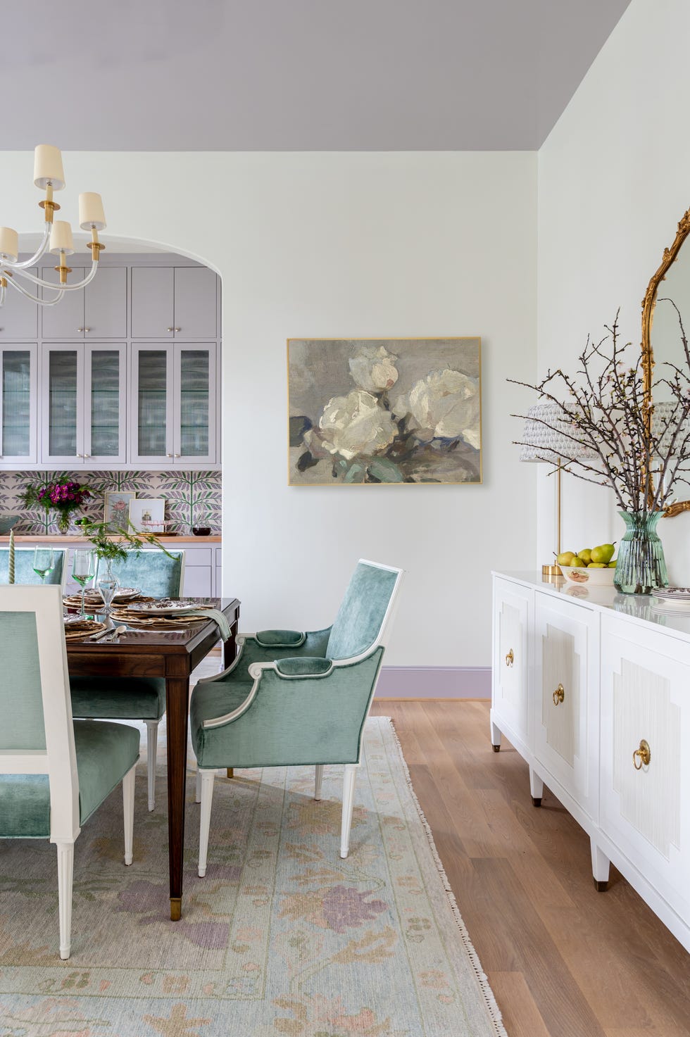 Formal dining room with purple ceiling and crown molding