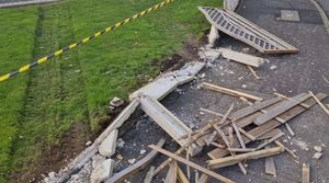 A fence destroyed by a truck