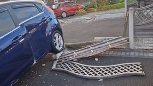 Cars and fences were hit directly, but even that couldn't stop the truck 