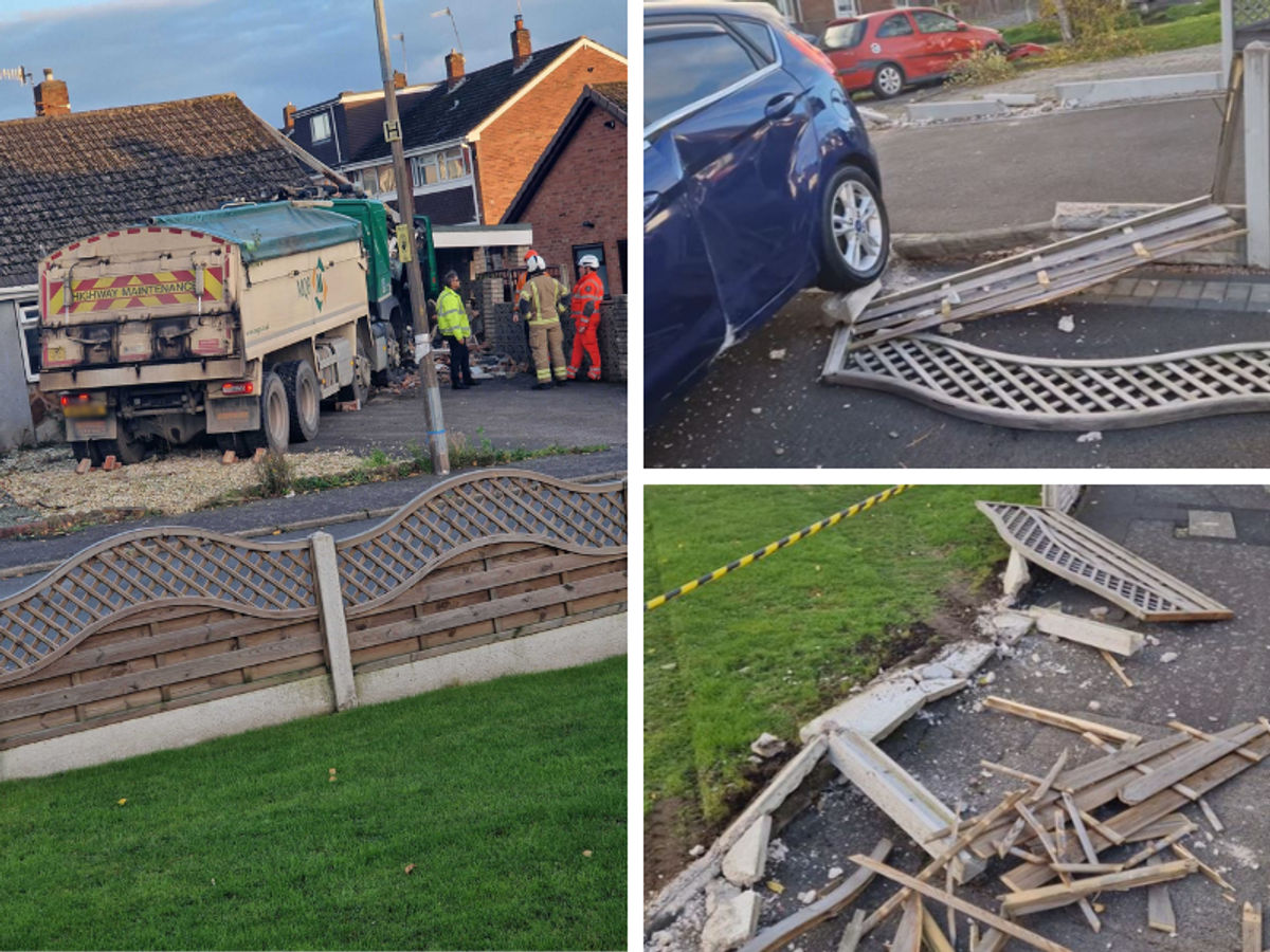 Driver treated for shock after truck plowed through fences and cars before crashing into a bungalow in Brierley Hill