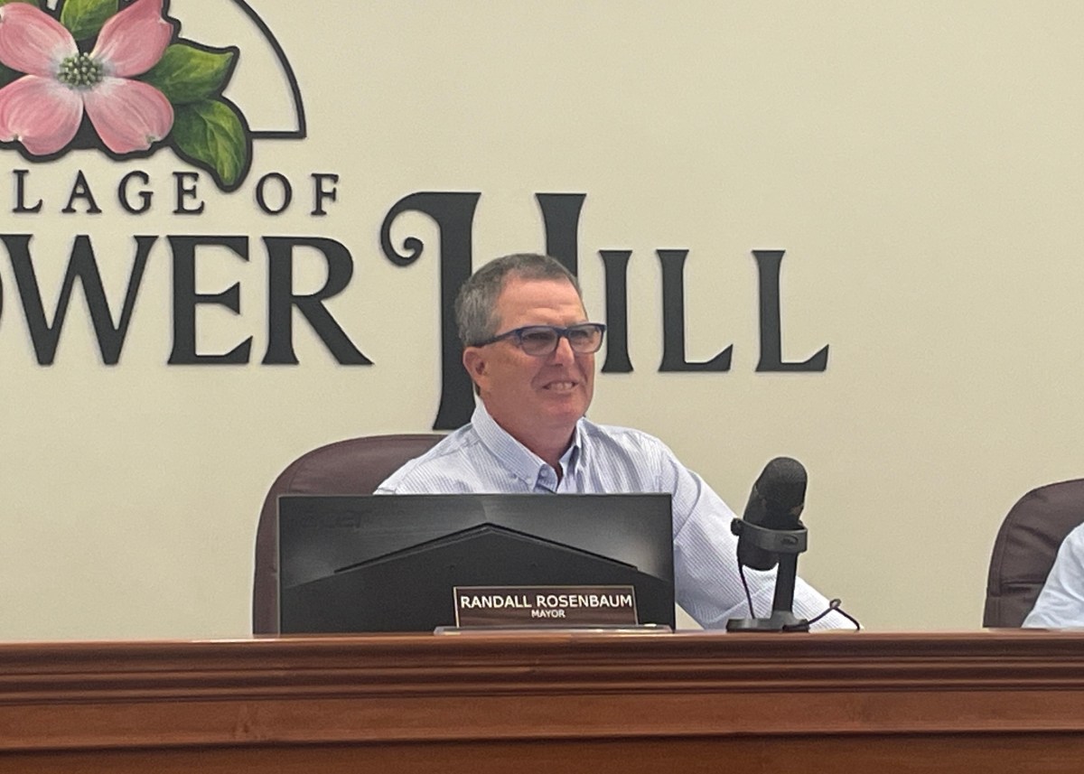 Flower Hill Mayor Randall Rosenbaum voiced a new tree's concerns about a new tree law that requires homeowners who remove a tree, replace it or pay a fee.