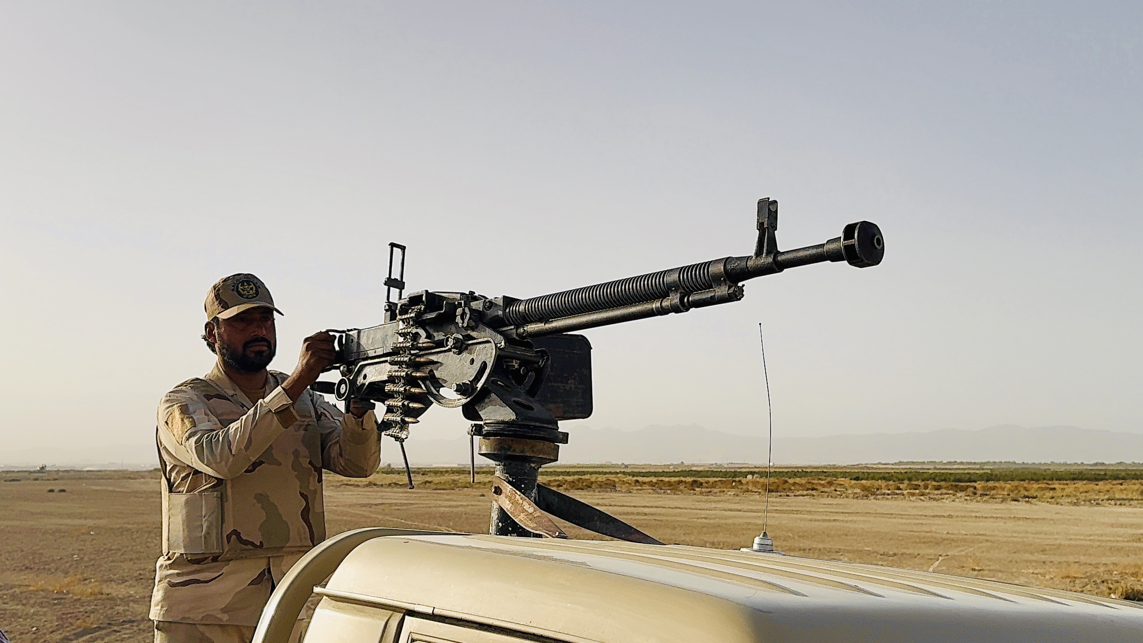A Pakistani soldier patrols along the de facto Pakistan-Afghan border in Chaman.