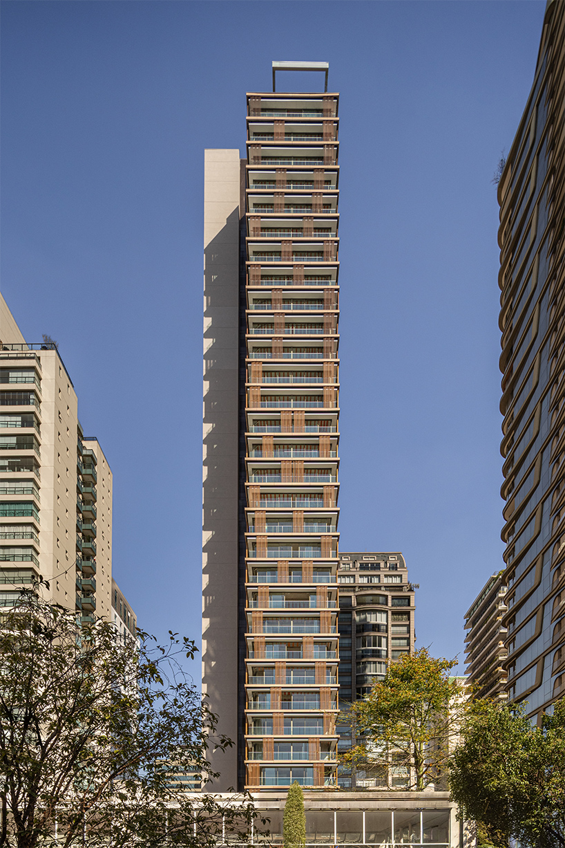 Kinetic wood panels run across the facade of Perkins&Will's residential tower in São Paulo