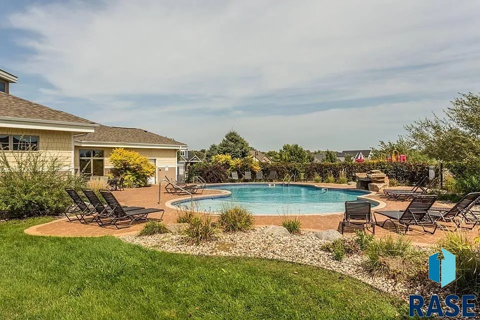 The sprawling home in Arbor's Edge is surrounded by nature and borders the Big Sioux River