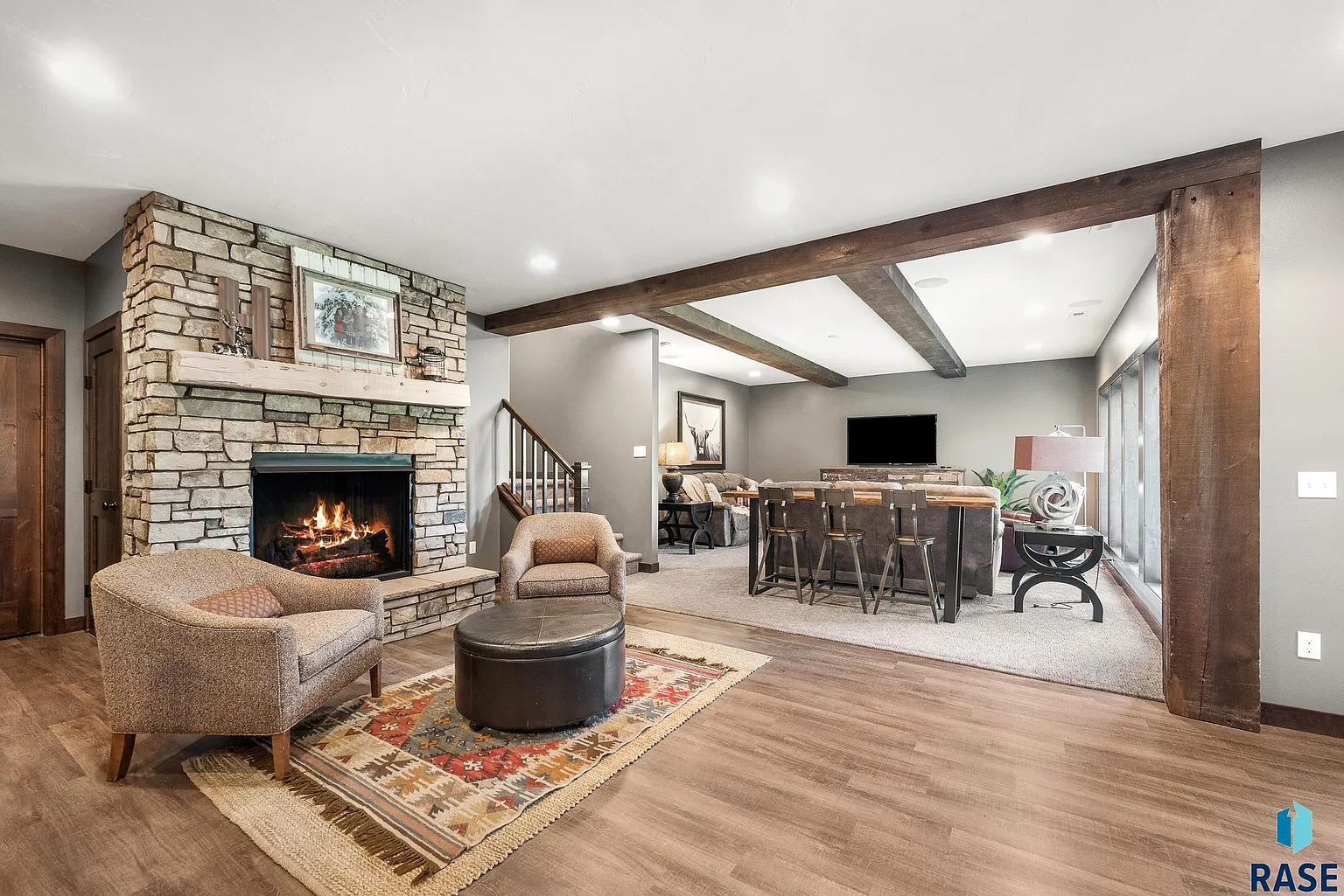 The sprawling home in Arbor's Edge is surrounded by nature and borders the Big Sioux River