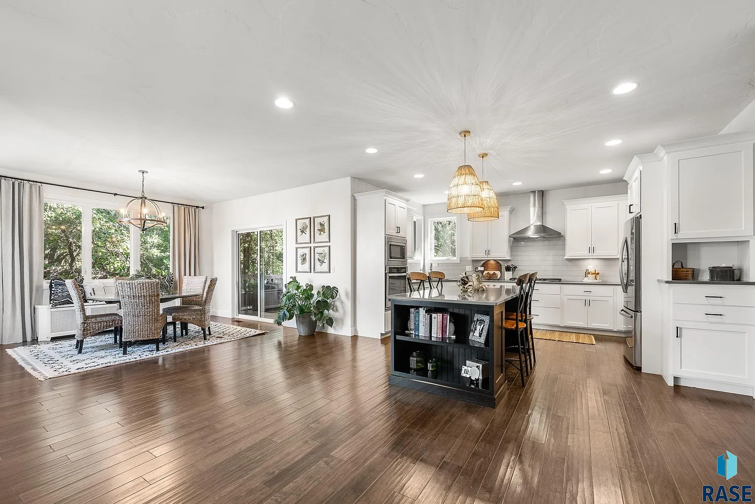 The sprawling home in Arbor's Edge is surrounded by nature and borders the Big Sioux River