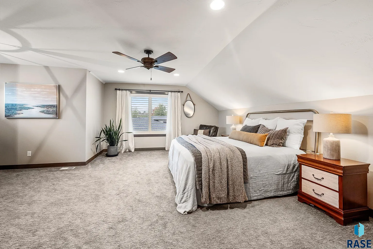 The sprawling home in Arbor's Edge is surrounded by nature and borders the Big Sioux River