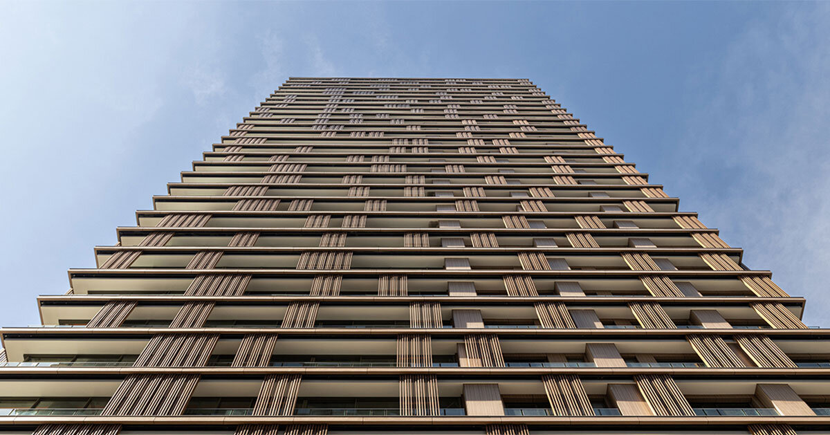 Kinetic panels run across the facade of the Perkins&Will residential tower