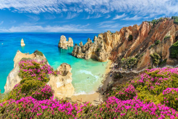 Landscape with the famous Praia do Camilo beach in the Algarve, Portugal - travel and tour world Algarve Portuguese