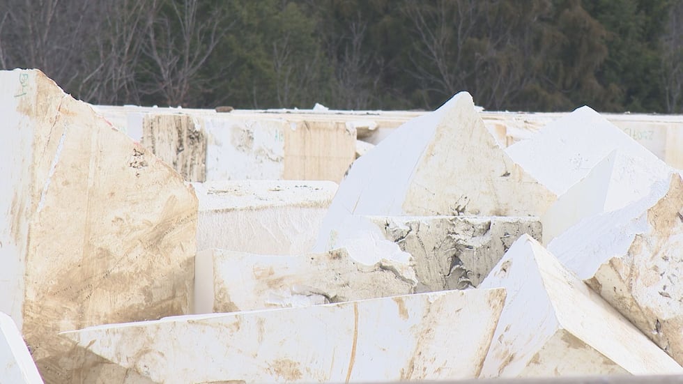 Large white blocks visible near a construction site on Interstate 64 in Shelby County are made of geofoam, a...