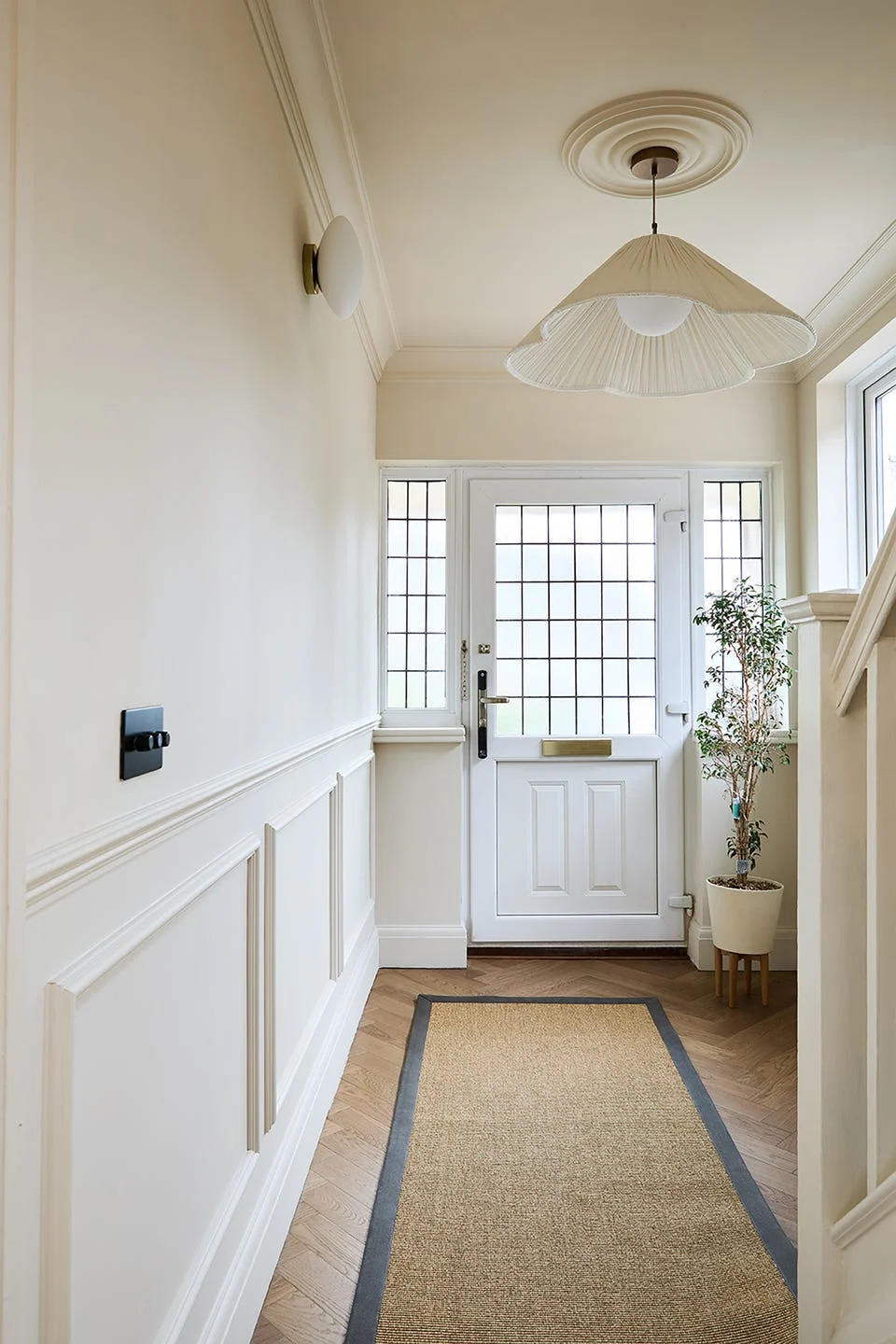 Quiet, serene hallway painted with milk white wall paint, Thorndown colours