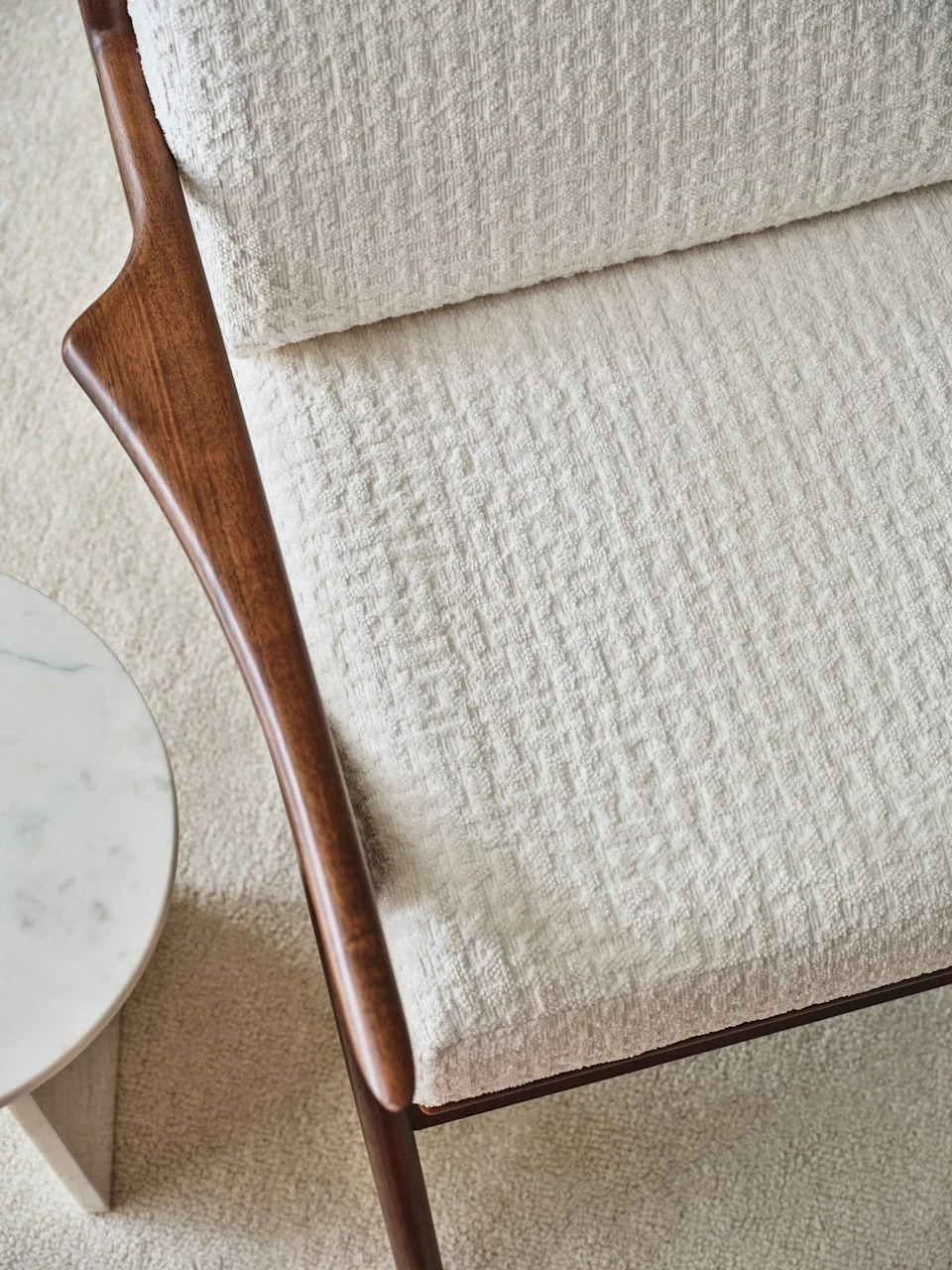White neutral armchair in the living room