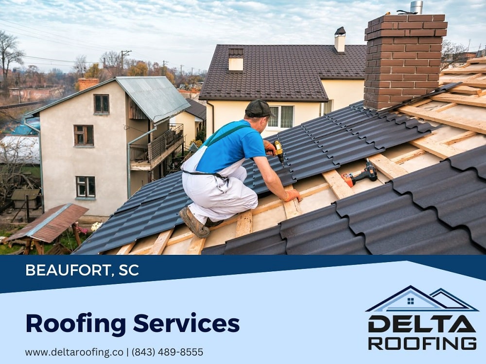 A roofer works on professional roof installation.