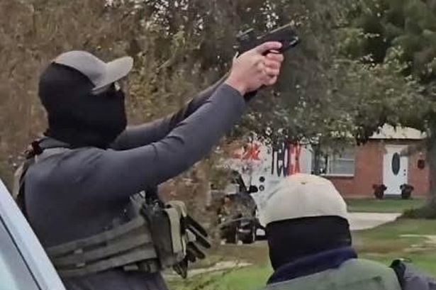 ICE agent aims gun at construction workers on roof in New Orleans during raids