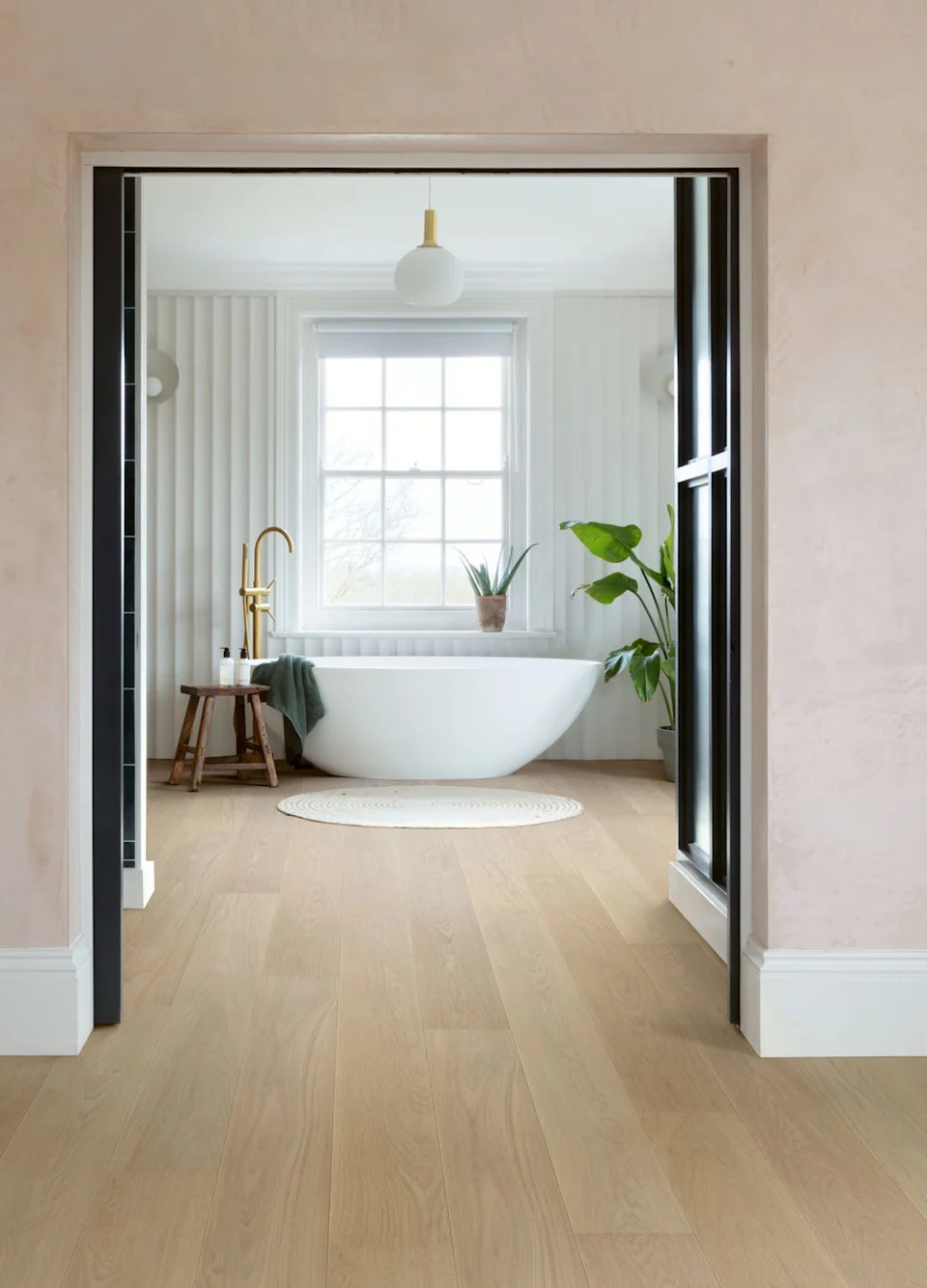 Spa-like bathroom with hardwood floors, extra-matte Cascada Lily white oak hardwood floors, quick entry